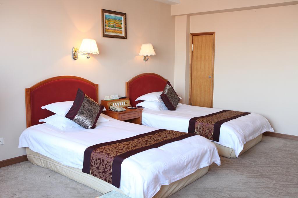 Tianhong Hotel Heze Habitación foto