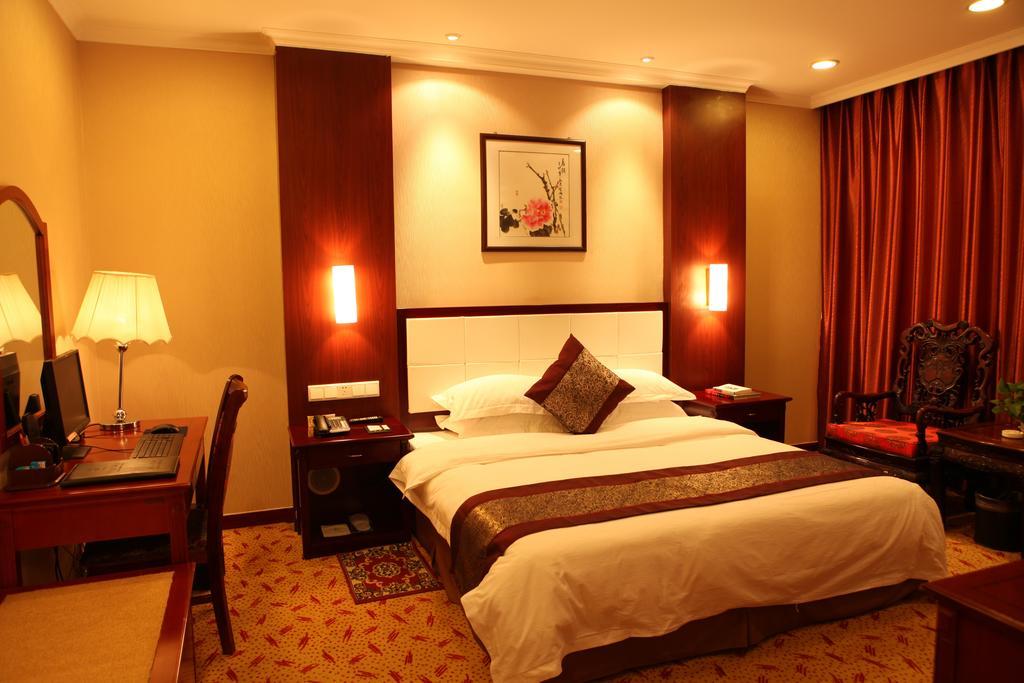 Tianhong Hotel Heze Habitación foto