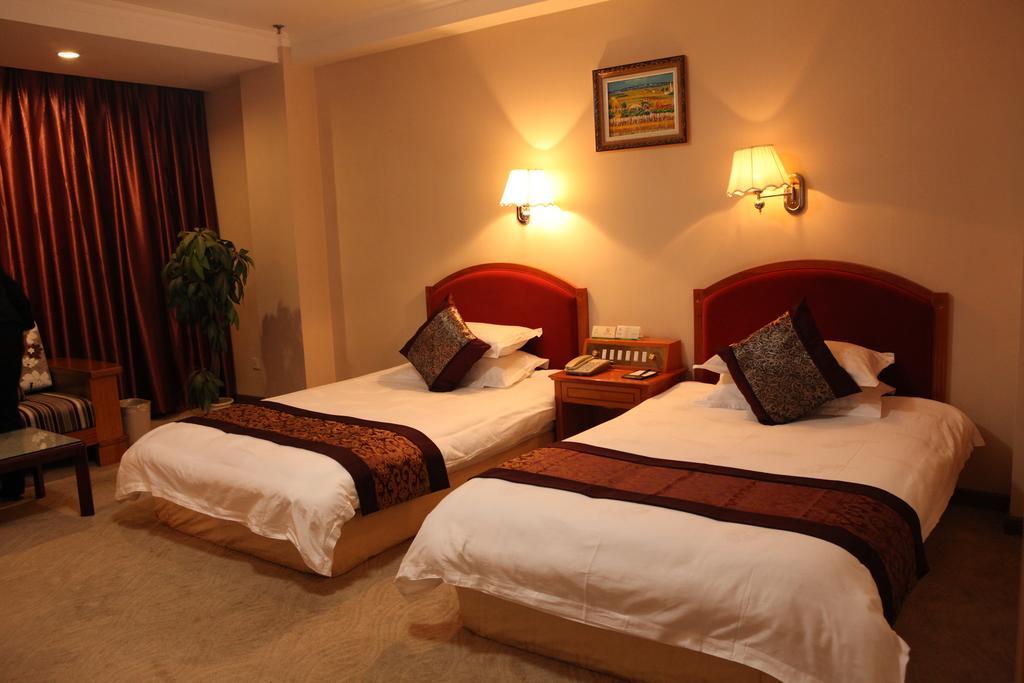 Tianhong Hotel Heze Habitación foto