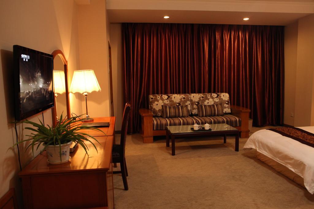 Tianhong Hotel Heze Habitación foto
