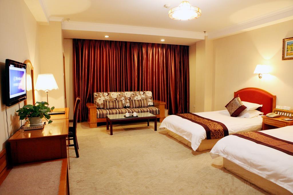 Tianhong Hotel Heze Habitación foto